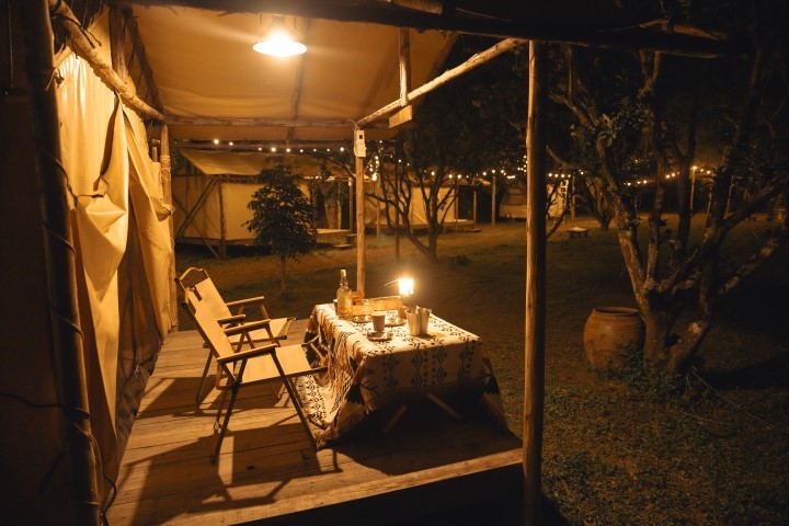 Safari tented camp at dusk